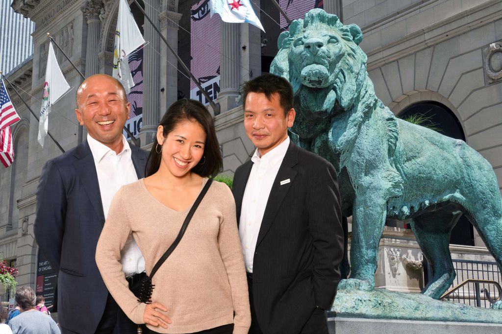 Guests look like they pose in front of Art Institute Chicago using green screen photography at private corporate event