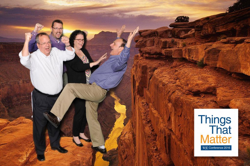 Push your co-worker off a cliff at the event with green screen photography by Merlo Media