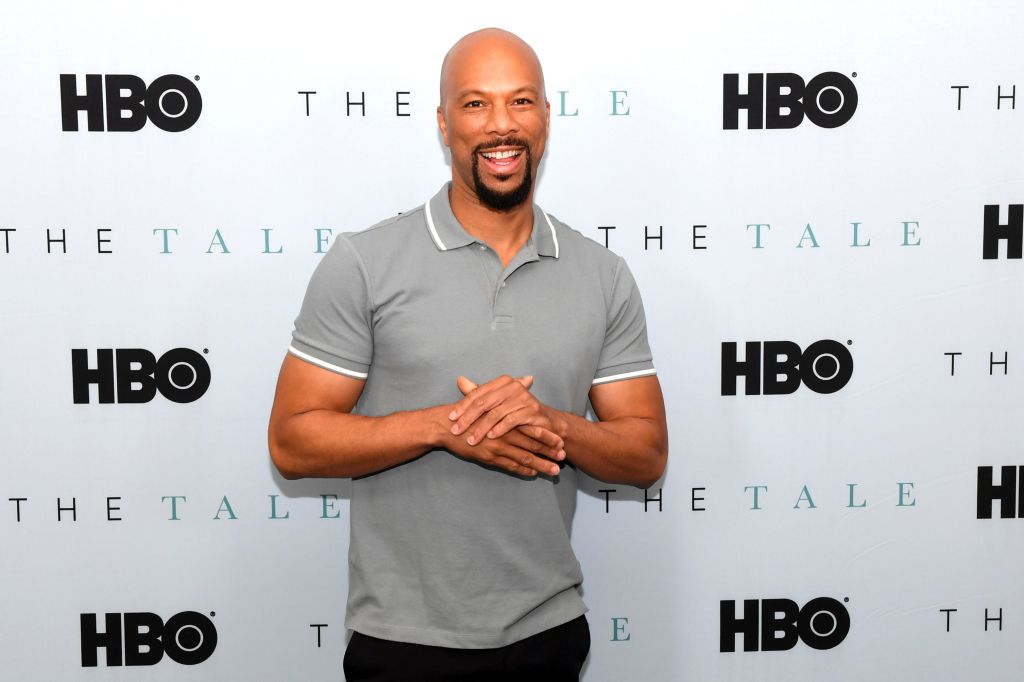 Common poses on step repeat at Chicago sneak premiere of HBO movie The Tale