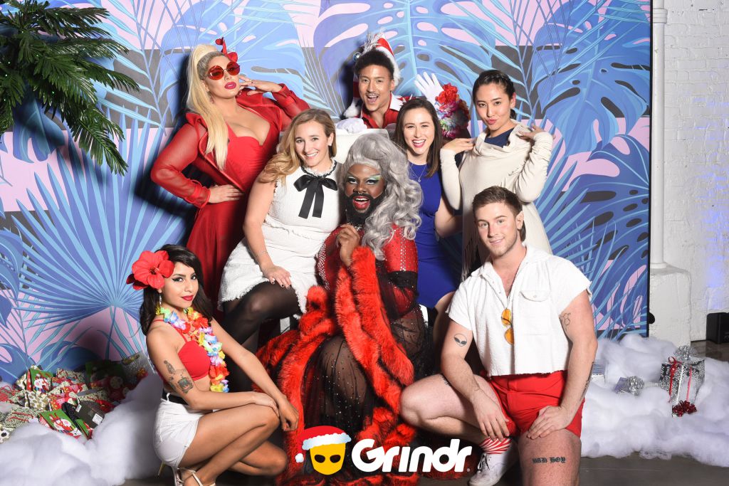 GRINDR holiday step repeat photo op with Lucy Stoole