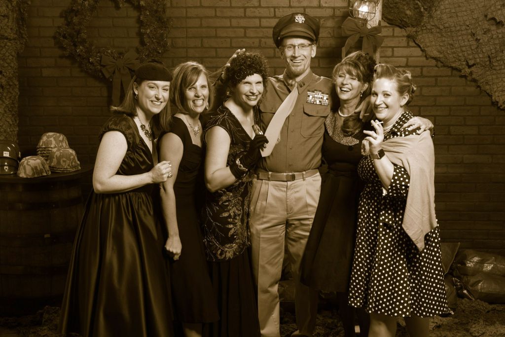 Sepia tone step repeat photos that look like World War II era for Raven Software WWII launch party
