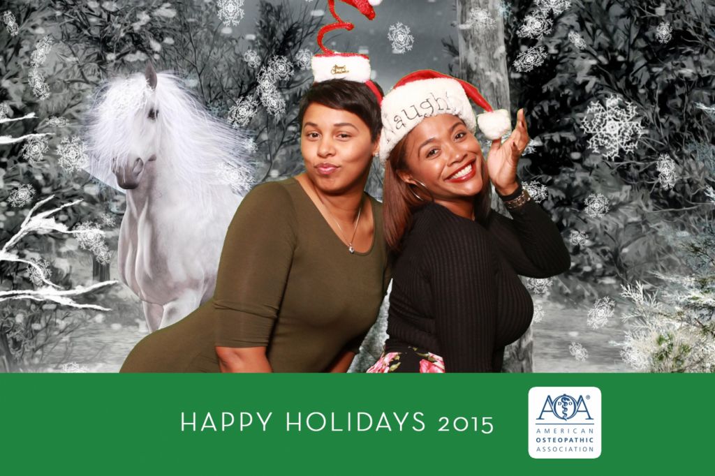 Chicago ladies celebrate holiday party with mystic snowy stallion in green screen photo booth experience
