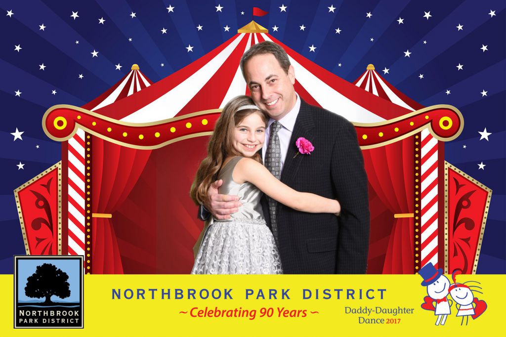 Adorable daddy daughter couple pose for green screen photobooth and get 4x6 photo giveaway printed onsite