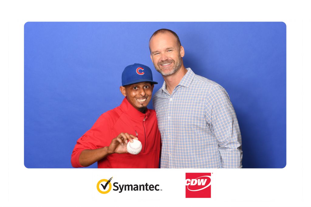 Chicago Cub David Ross poses with fan who gets 4x6 photo printed onsite