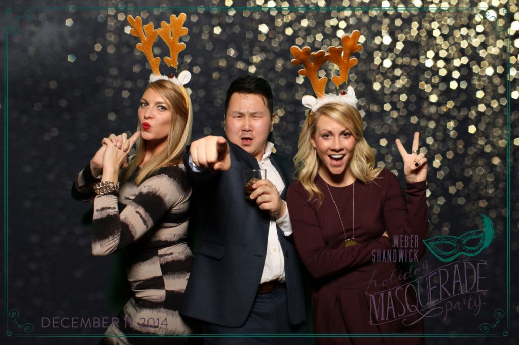 Elvis and his angels pose at holiday green screen photobooth
