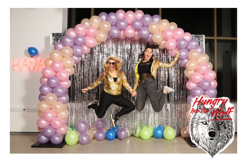 Havas Chicago holiday party adopts 80s theme Hungry Like the Wolf for step repeat photography