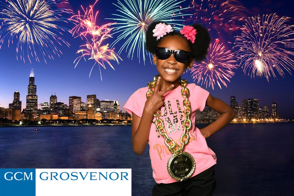 Photo print op of little girl at family day green screen photo booth corporate Chicago event