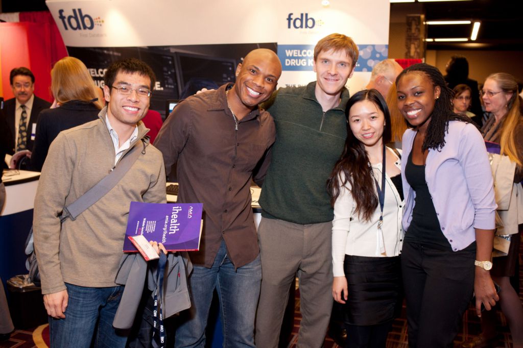 Diverse student crew poses for photo at AMIA symposium